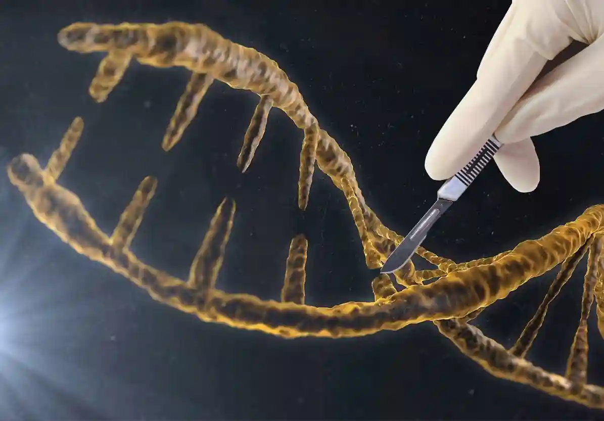 Grafika przedstawiająca kawałek DNA rozcinany skalpelem trzymanym w dłoni